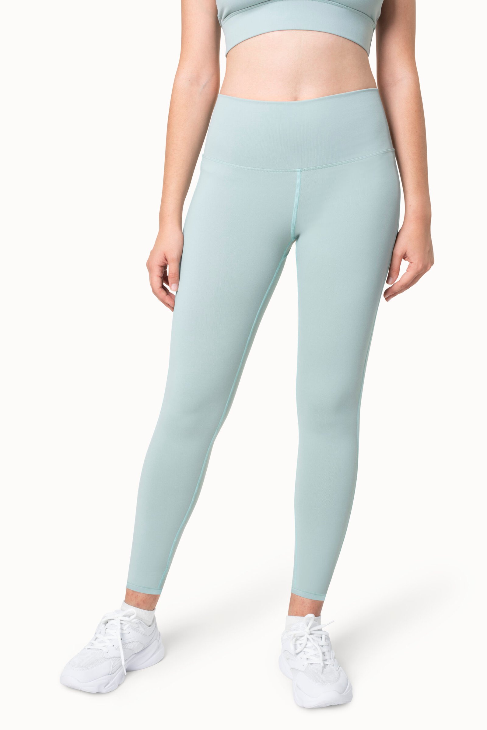 Plain blue yoga pants sportswear apparel studio shoot